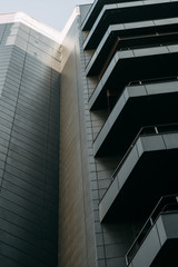 Minimalism in architecture and buildings. The black facade of the house and textures.