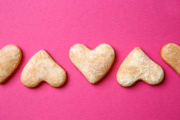 Tasty cookies on color background