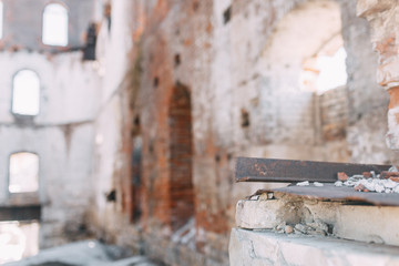 Background for design. Old destroyed factory in blur.