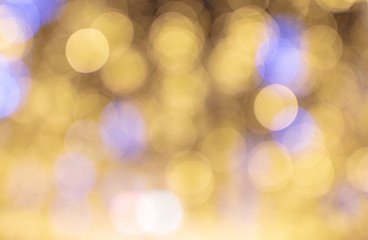 Golden bokeh lights as abstract background