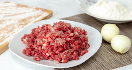 Stuffing and flour in the kitchen for meatballs
