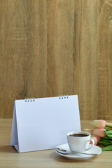 Holiday concept coffee and empty calendar
