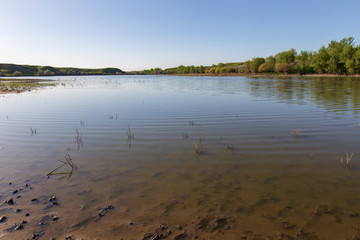 Pond in spring steppe as background