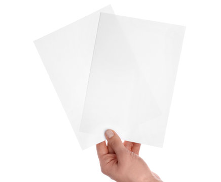 Female hand with blank invitation cards on white background