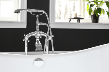 Modern clean bathtub at home