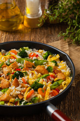 Nasi goreng. Fried rice with egg and vegetables.