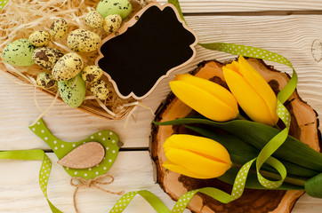 Easter composition on a wooden background. - Image
