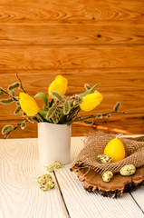 Easter composition on a wooden background. - Image