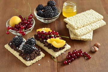 Sandwiches with nut-chocolate paste and berry stuffing