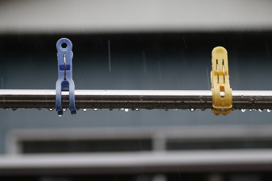 Clothespins and laundry pole at rany day at outsider in Japan