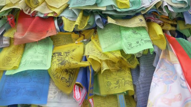 Colorful Tibetan prayer flags swaying in the wind in the temple, Ulan Ude Russia