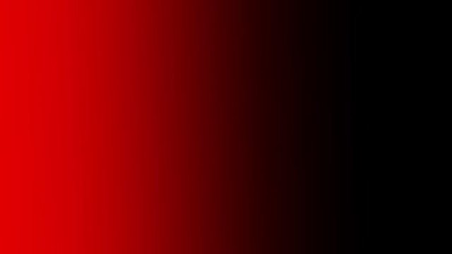 Abstract blurred shape of red neon lights moving on the dark background.