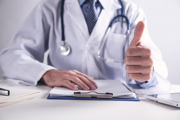 Fototapeta premium Medicine doctor show OK sign with thumb up.