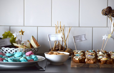 Celebrations with carrot cake, french macarons, cake pops and cookies