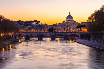 Fototapeta na wymiar Twilight view of St. Peter's Basilica with Tiber River in Rome, Italy