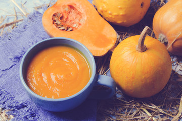 pumpkin soup on a wooden background