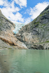 Naklejka na ściany i meble Melting Briksdal glacier in Norway, close up
