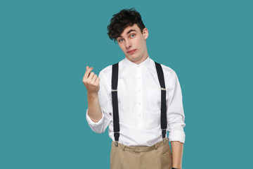 Worry or hopeful man showing money gesture.