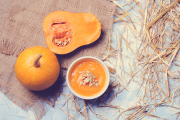 pumpkin soup on a wooden background