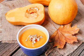pumpkin soup on a wooden background