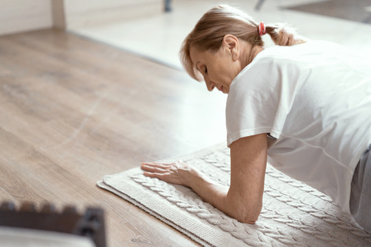 Beautiful Mature Woman Stands In Plank Position