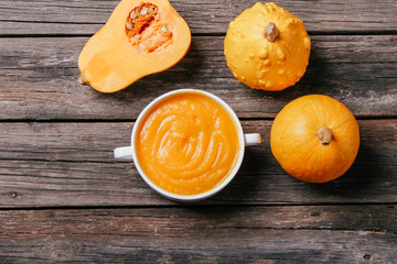 pumpkin soup on a wooden background