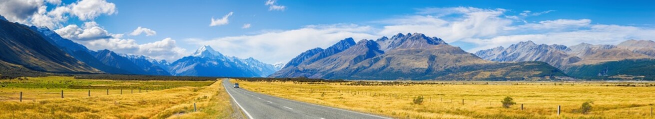 Picture panoramic view of car on the road go to Mt. Cook, New Zealand national park at South island...