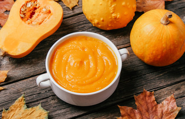 pumpkin soup on a wooden background