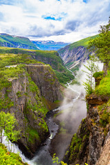 Voringsfossen Waterfall. Falls in mountains Norway