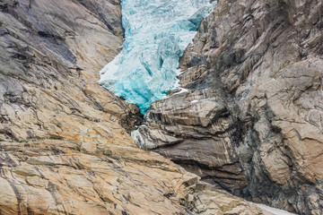 Briksdalsbreen glacier with melting blue ice