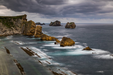 Dramatic view of Playa de la Arnia, Cantabria, Spain.