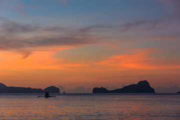 Cloudy landscape in the sea. El Nido Palawan, Philippines. Tropical clouds in the sea on a sunset background	