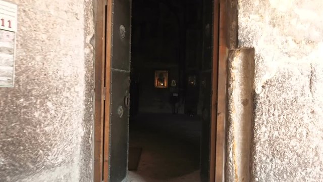 Visit the ancient temple Dormition of the Mother of God in the cave monastery Vardzia. Interior of Vardzia mountain church of Georgia country. Dormition of the Mother of God
