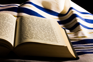 Hebrew prayer book and a tallit, a jewish prayer shawl