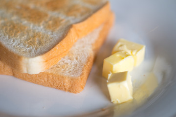 Morning breakfast, butter and toasts.