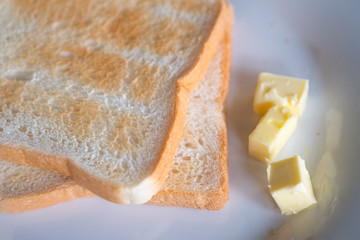 Morning breakfast, butter and toasts.