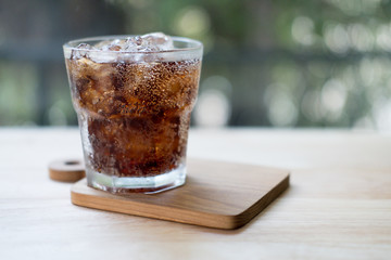 Cold soft drink refreshing pop flavoured with ice cubes.