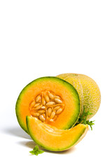 Sweet melon slices isolated on white