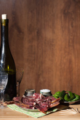 Wine with wineglass and different delicious