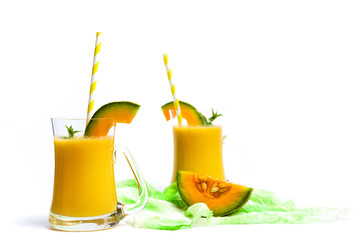 Sweet melon smoothie isolated on white