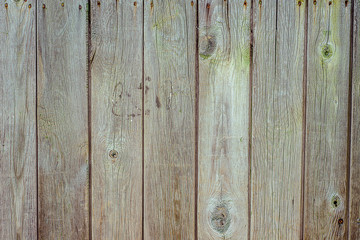 Old grey plank fence. Horizontal grunge wood texture