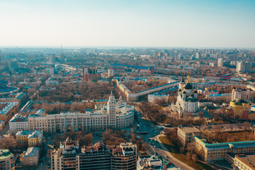 Obraz premium Aerial Voronezh panorama of city midtown in spring evening, roads with traffic cars, famous Orthodox cathedral church and South-Eastern Railway Building