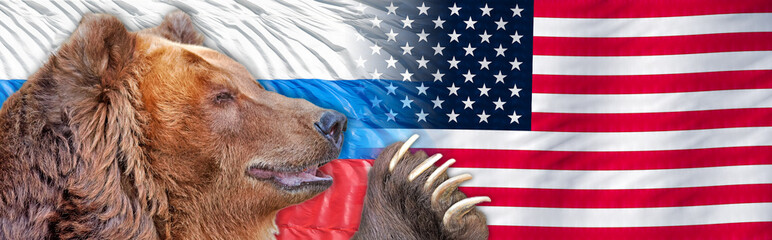 usa flag blended into flag of russia background with angry russian bear and his arm with claws...