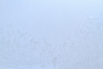 Frosty patterns on a frozen ice box in the early morning
