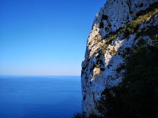 rock, moon and sea