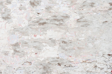 Wall fragment with scratches and cracks