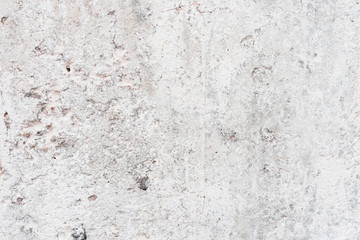 Wall fragment with scratches and cracks