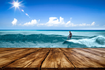 Summer table background of free space and surfer on waves. 