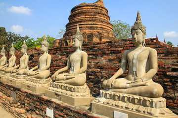 Fototapeta na wymiar Ancient Buddha Statue at Wat Yai Chaimongkol in Ayutthaya ,Thailand.