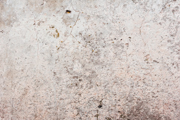 Wall fragment with scratches and cracks